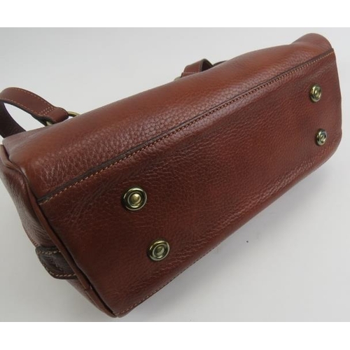 489 - A Mulberry tan leather handbag with original Mulberry plaid lining.
Provenance: Part of a private co... 