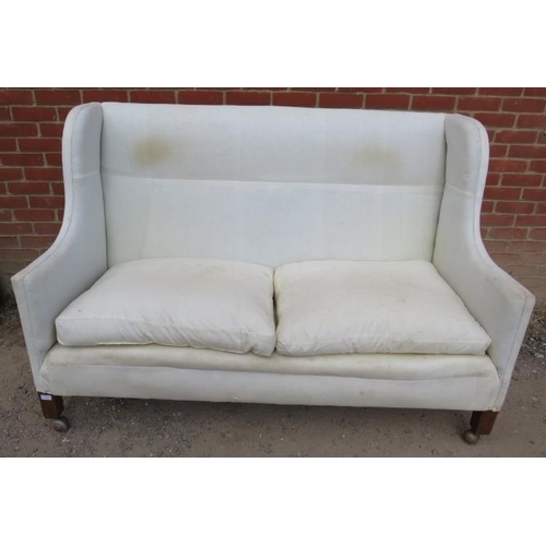 836 - A 19th century high-back large two-seater sofa, with loose feather-filled seat cushions, upholstered... 