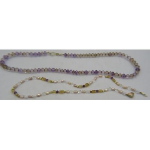 460 - A delicate necklace of citrine, amethyst & pearls with yellow metal spacers on a 14ct three coloured... 