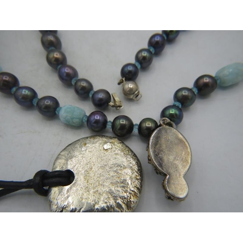 469 - An unusual possibly Russian black pearl & larimar necklace, with 925 marked larimar pendant, approx ... 