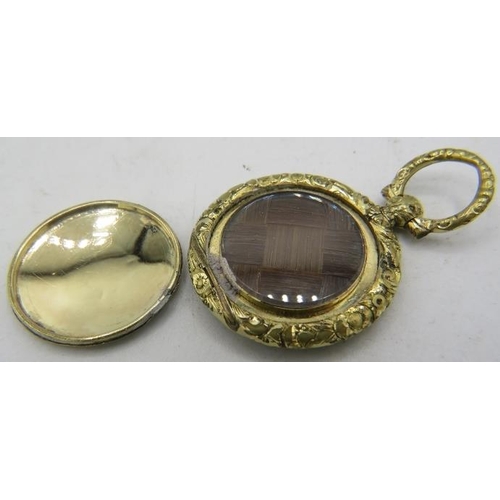 473 - A Regency engine turned locket (although we are informed by the vendor that they believe it to be a ... 