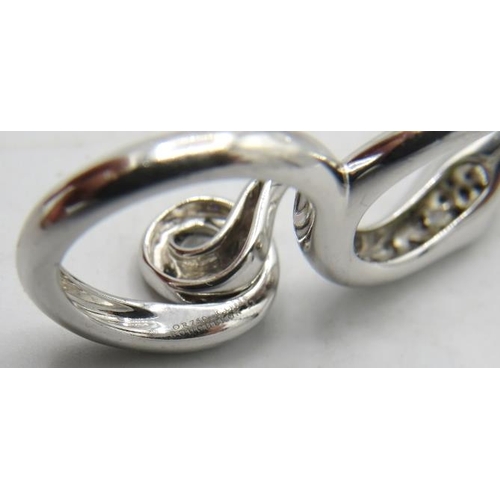 476 - A fine and unusual Boucheron 18ct white gold & 24 diamond designer snake ring. Diamonds approx 0.30c... 