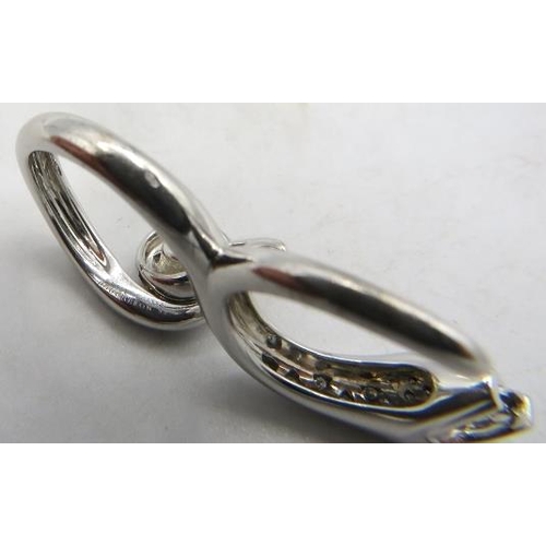 476 - A fine and unusual Boucheron 18ct white gold & 24 diamond designer snake ring. Diamonds approx 0.30c... 