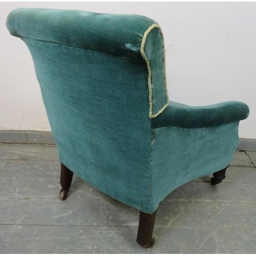 885 - A Victorian low armchair with scrolled back, upholstered in teal velvet material with silver braidin... 