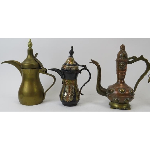 223 - A group of five small Middle Eastern metalwork ewers. (5 items) 9.7 in (24.5 cm) tallest height. Con... 