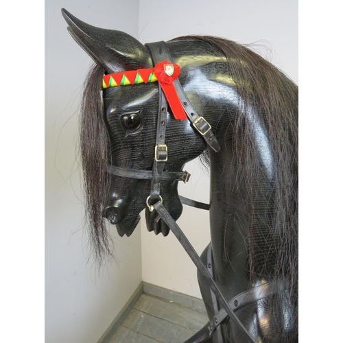 1 - A Stevenson Brothers Ferrari Scuderia themed ebonized oak rocking horse. This full sized horse carve... 