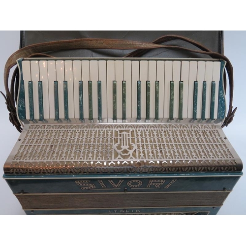 100 - An Italian Sivori piano accordion. Modelled with one hundred and twenty buttons and 41 keys. Travell... 