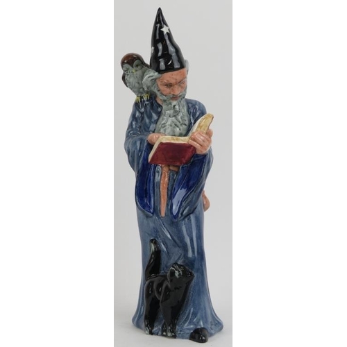 129 - A Royal Doulton ‘The Wizzard’ figurine. HN 2877. 9.8 in (24.8 cm) height. 
Condition report: Good co... 