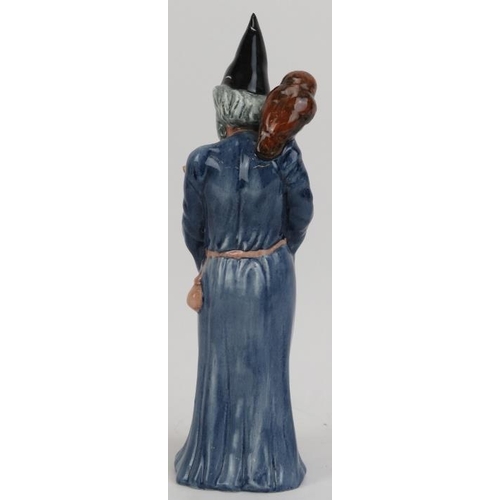 129 - A Royal Doulton ‘The Wizzard’ figurine. HN 2877. 9.8 in (24.8 cm) height. 
Condition report: Good co... 