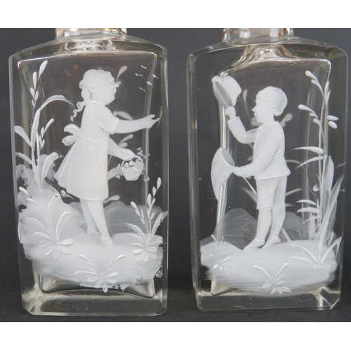 142 - A group of Mary Gregory glassware, late 19th/early 20th century. Comprising a pair of perfume scent ... 