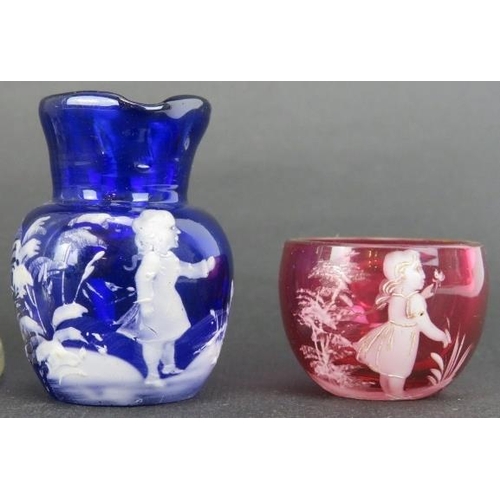 142 - A group of Mary Gregory glassware, late 19th/early 20th century. Comprising a pair of perfume scent ... 