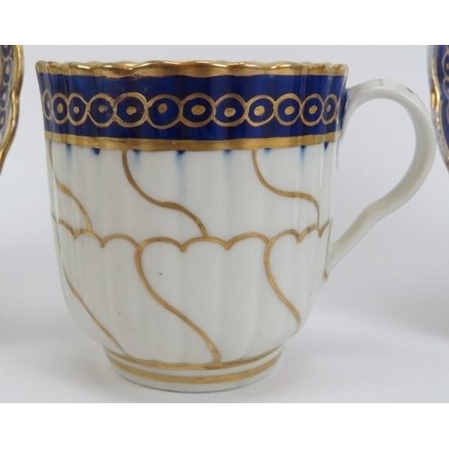 17 - A group of Caughley gilt blue and white porcelain cups and saucers, late 18th century. George III pe... 