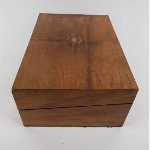 172 - A late Victorian parquetry inlaid writing slope box. With a compartmented interior and gilt foliate ... 