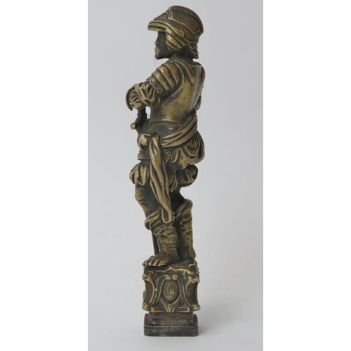 174 - A large brass and wrought iron heraldic wax seal. Modelled in the form of a European knight in armou... 