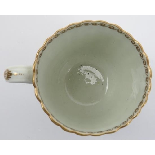 18 - A group of Caughley gilt white porcelain cups and saucers, late 18th century. George III period. Com... 