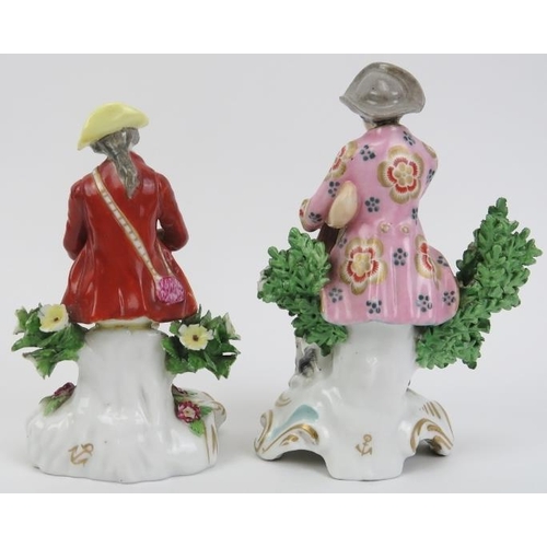 19 - Two Samson polychrome decorated porcelain figurines, 19th century. Gilt painted anchor marks to both... 