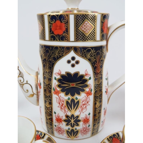 20 - A Royal Crown Derby Old Imari pattern porcelain coffee set. Comprising a coffee pot, a sugar bowl an... 