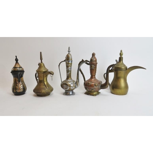 223 - A group of five small Middle Eastern metalwork ewers. (5 items) 9.7 in (24.5 cm) tallest height. Con... 