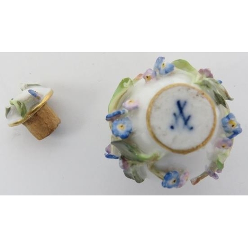 23 - A group of German Meissen and related miniature porcelain wares, 20th century. Comprising a pair of ... 