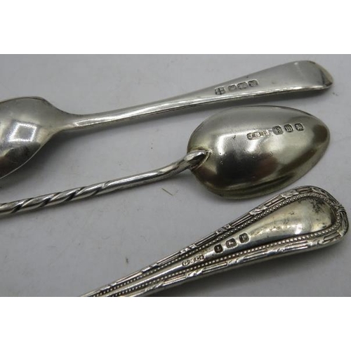 304 - A silver hand mirror, Birmingham hallmarks worn. A pair of silver backed clothes brushes, Birmingham... 