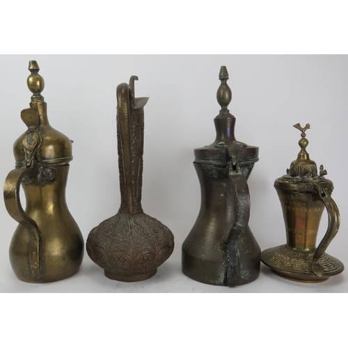 31 - A group of Middle Eastern Dallah's and a ewer, probably 19th century. (4 items) 11.9 in (30.3 cm) ta... 