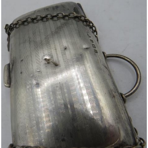 314 - A silver purse with original lining, Birmingham 1909, two silver napkin rings both fully hallmarked ... 