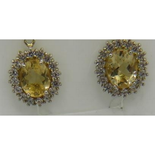 335 - A pair of D' joy citrine earrings, lever back 925 sterling silver. 16mm x 14mm portrait setting.
Con... 