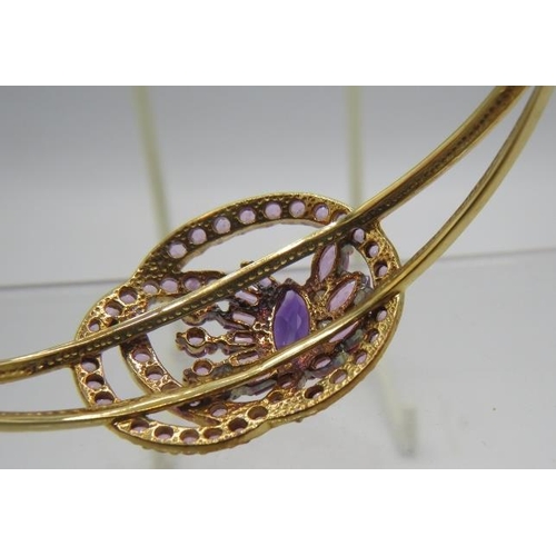 362 - A 9ct yellow gold bangle set with centre marquise cut amethyst approx 12mm x 7mm, which is surrounde... 