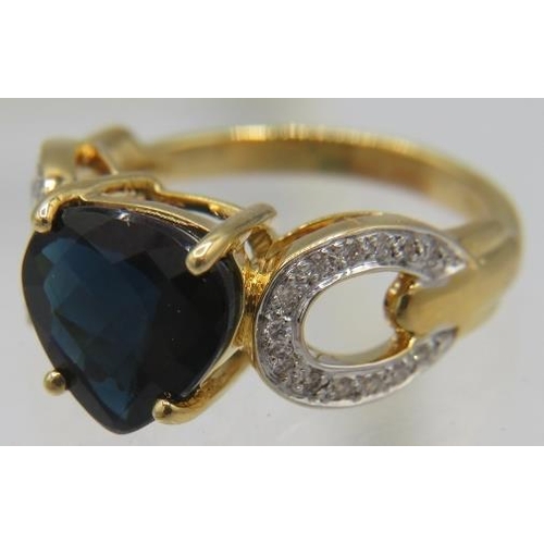 364 - An 18ct yellow gold ring set with a pear shaped checker board cut Mutuca indicolite, approx 3.12cts ... 