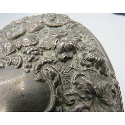 375 - A heavy embossed silver hand mirror decorated with grapes, vines & cherubs. Bevelled mirror, Birming... 