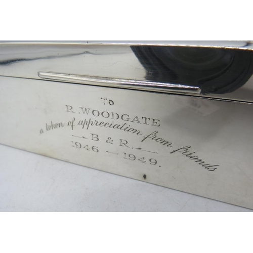 380 - A silver cigarette box with engraved side, Birmingham 1928.
Condition report: Small front dent and s... 