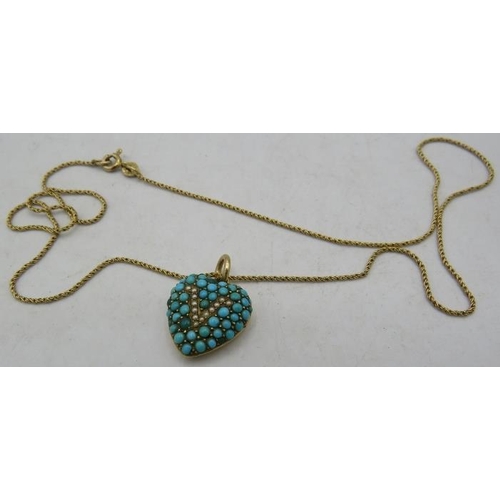 386 - A yellow metal heart shaped turquoise encrusted pendant/locket with a 'V' set with tiny seed pearls ... 