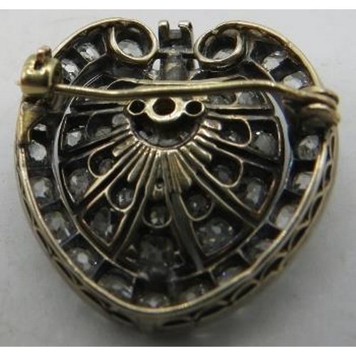 390 - A fine early Victorian silver & gold diamond brooch of pierced palmette design, set throughout with ... 