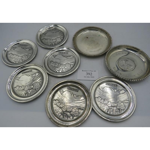 392 - Two silver dishes one inset with one rupee, both marked 'silver' and five Norwegian small coasters, ... 