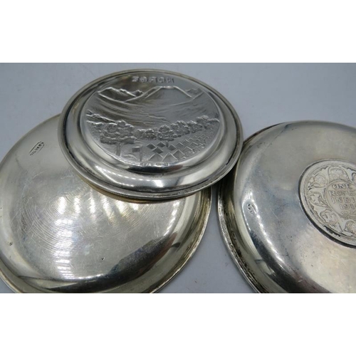 392 - Two silver dishes one inset with one rupee, both marked 'silver' and five Norwegian small coasters, ... 