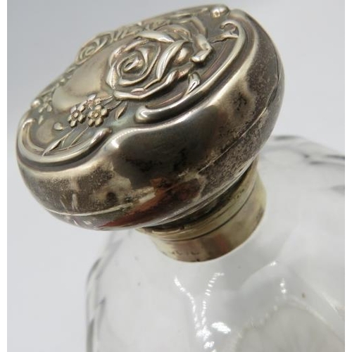 399 - A heavy cut glass circular scent bottle with silver hinged top & inner stopper, London 1921. Another... 