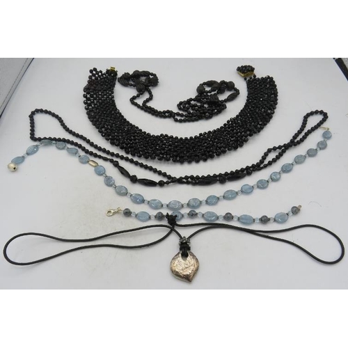 457 - A smokey topaz flattened bead necklace interspersed with blue chalcedony & white metal spacers on a ... 