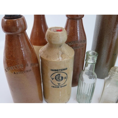 46 - An antique and vintage collection of glass bottles, 19th century and later. (22 items) 11.2 in (28.5... 