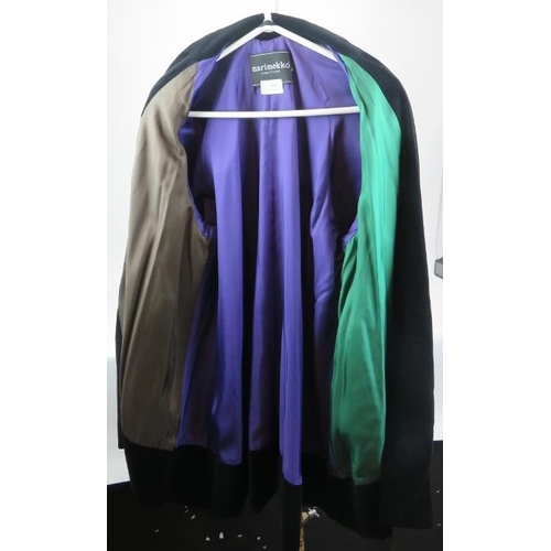 482 - A Marimekko Finnish designer black velvet opera jacket with various coloured linings.
Provenance: Pa... 