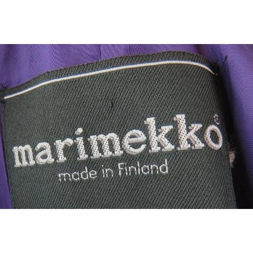 482 - A Marimekko Finnish designer black velvet opera jacket with various coloured linings.
Provenance: Pa... 