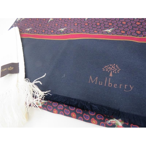 483 - A Mulberry navy and maroon silk scarf decorated with birds, approx 140cm x 30cm approx and a Mulberr... 