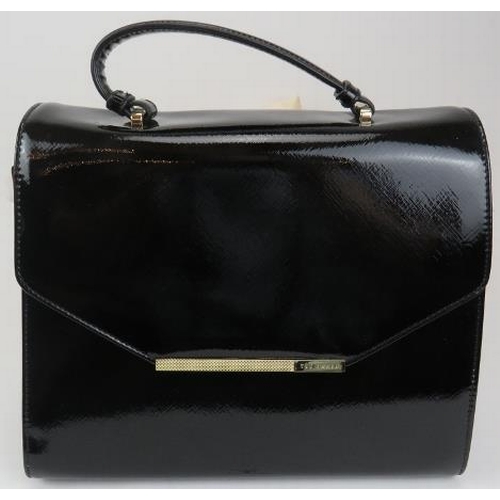 488 - A Ted Baker black patent handbag with gold coloured trim, with dust bag.
Provenance: Part of a priva... 