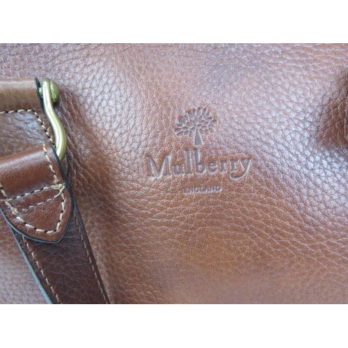 489 - A Mulberry tan leather handbag with original Mulberry plaid lining.
Provenance: Part of a private co... 