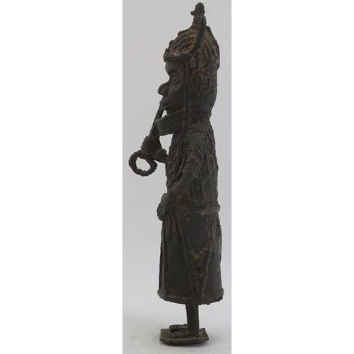 53 - A West African Benin bronze figure. 15 in (38 cm) height. Condition report: Some wear with age.