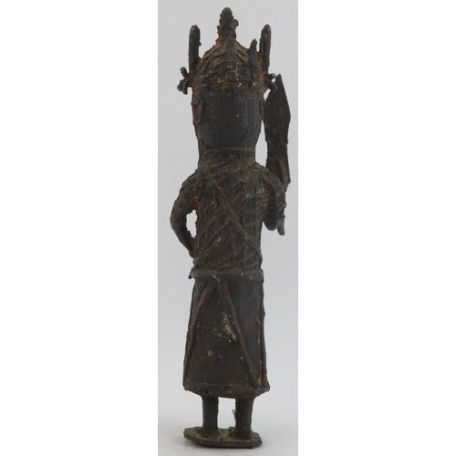 53 - A West African Benin bronze figure. 15 in (38 cm) height. Condition report: Some wear with age.