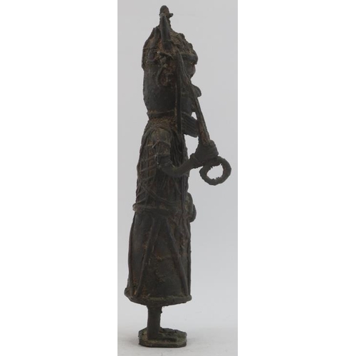 53 - A West African Benin bronze figure. 15 in (38 cm) height. Condition report: Some wear with age.