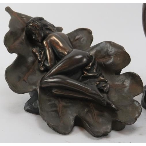 69 - A group of three bronzed erotic female figures, late 20th century. Comprising a mermaid on a rock, a... 