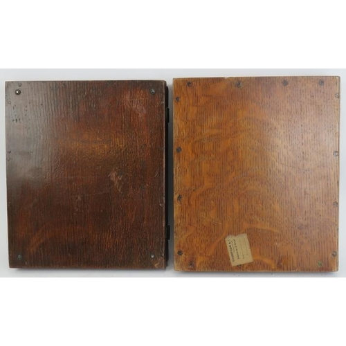 74 - Two unusual matching European writing desk boxes inset with bronze plaques, late 19th/early 20th cen... 