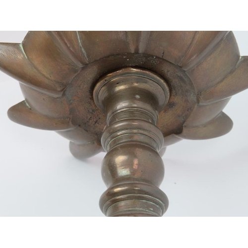 77 - An Indian bronze floor standing temple 'Puja' oil lamp with nine wick diya reservoir, 19th century. ... 