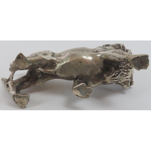 79 - A European silver plated metal lion, probably 19th century. 5.7 in (14.5 cm) length. 
Condition repo... 